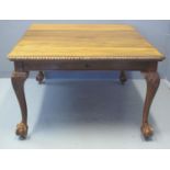 EARLY 20TH CENTURY MAHOGANY EXTENDING DINING TABLE with rope twist edge above carved foliate and