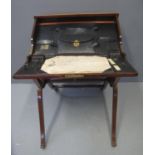 VICTORIAN MAHOGANY FOLDING CAMPAIGN TRAVELLING WRITING DESK having hinged brass mounts, the interior