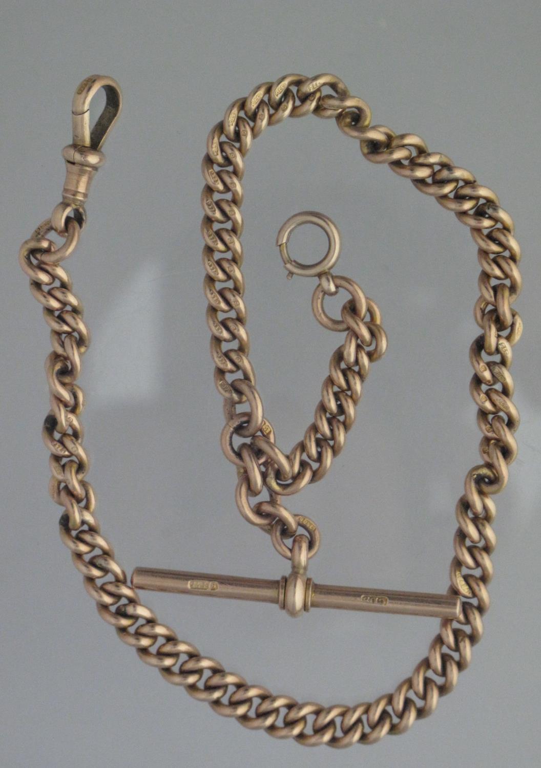 9CT GOLD CURB LINK GRADUATED SHORT ALBERT CHAIN with T bar and spring clasps, 34cm long approx,