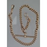 9CT GOLD CURB LINK GRADUATED SHORT ALBERT CHAIN with T bar and spring clasps, 34cm long approx,