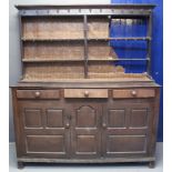 18TH CENTURY CARDIGANSHIRE OAK DRESSER probably altered from a mule chest, having boarded two