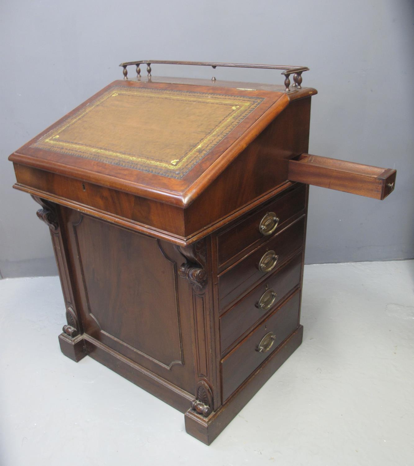 LATE VICTORIAN MAHOGANY DAVENPORT DESK having moulded spindle gallery top above a leather inset