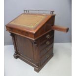 LATE VICTORIAN MAHOGANY DAVENPORT DESK having moulded spindle gallery top above a leather inset