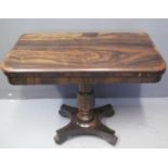 19TH CENTURY ROSEWOOD TEA TABLE, the moulded top with hinged lid above a gun barrel pedestal