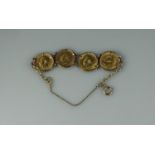 9CT GOLD BRACELET OF FOUR HALF SOVEREIGNS, 1912, 1915, 1916 and 1912. Weight in total 22.5g