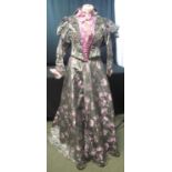 19TH CENTURY FLORAL DESIGN SILK BROCADE BODICE AND SKIRT SET with gigot sleeves and possibly later