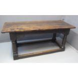 17TH CENTURY STYLE OAK REFECTORY TABLE having three plank cleated top above arcade frieze