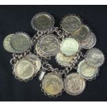 A MULTI COIN CHAIN BRACELET set with various gold sovereigns including; 1887, 1900, 1905, 1899,