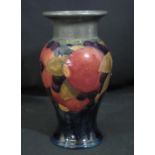 MOORCROFT ART POTTERY TUBE LINED POMEGRANATE VASE of baluster form with an applied pewter collar and