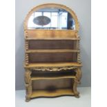 VICTORIAN ROSEWOOD WHATNOT the carved mirror back above five shaped shelves of waterfall design with
