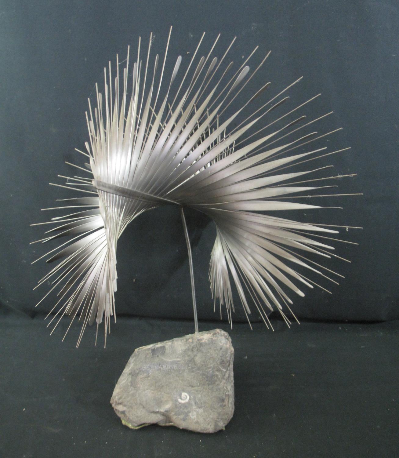 BERNARD ELLIS, modern steel sculpture, titled 'Flight', fan shaped feathers, on natural stone