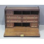 UNUSUAL BASICALLY 18TH CENTURY OAK CAMPAIGN UPRIGHT SECRETAIRE A'abbant,possibly of maritime