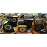 Collection of early and mid Century mantel and other clocks, with various designs, some in bakelite,