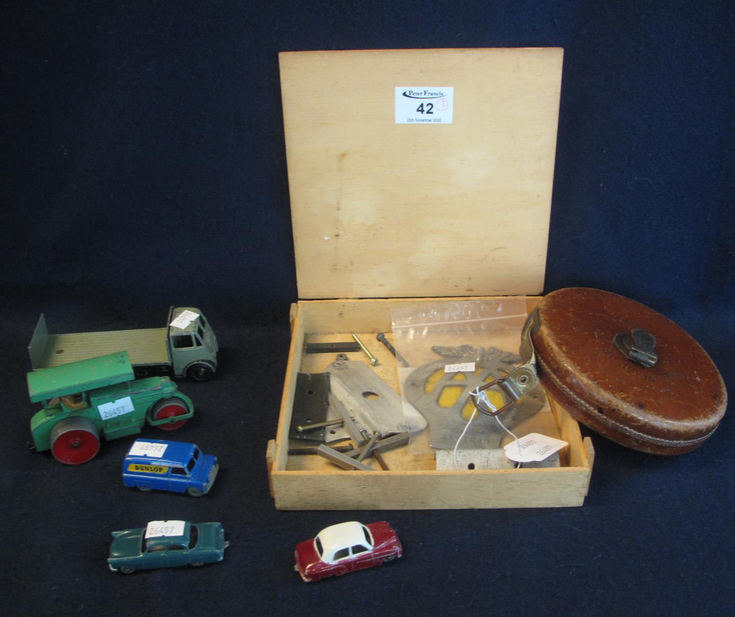A box of play worn vintage Dinky and Matchbox toys to include, 'Guy' lorry, Aveling Barford road