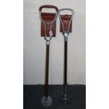Two traditional shooting sticks, one with adjustable stem. (B.P. 21% + VAT)