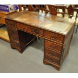 Reproduction mahogany writing desk having three drawers to each pedestal. (B.P. 21% + VAT)