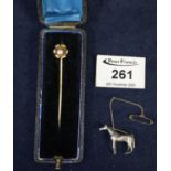 Yellow metal pearl set tie or stock pin and a small silver horse pin brooch. (B.P. 21% + VAT)