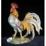 20th Century continental pottery study of a cockerel on naturalistic base. (B.P. 21% + VAT)