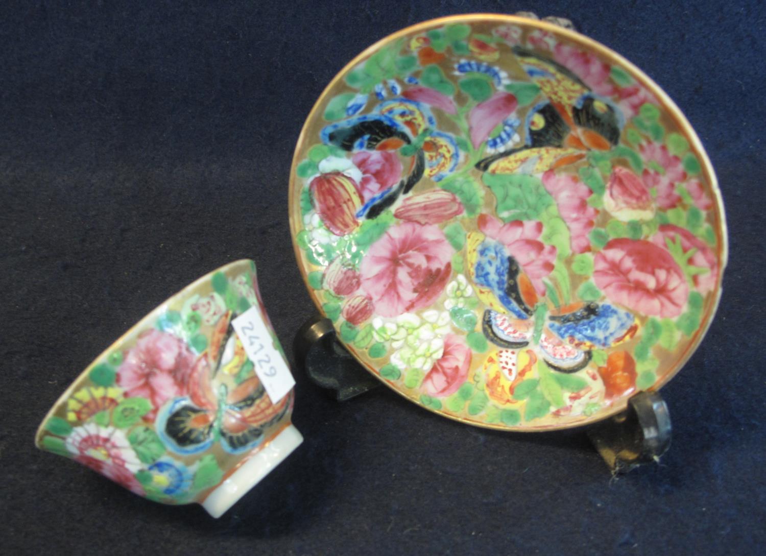 Chinese Canton porcelain tea bowl and saucer overall decorated in enamel famille rose design with