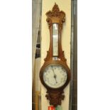 Early 20th Century carved oak wheel barometer. (B.P. 21% + VAT)