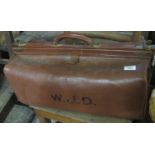 Early 20th Century leather Gladstone bag with the initials W.J.D. (B.P. 21% + VAT)