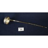 Silver repousse brandy ladle with inset Georgian coin and wrythen wooden handle. (B.P. 21% + VAT)
