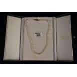 String old cultured pearls with 9ct gold clasp (B.P. 21% + VAT)