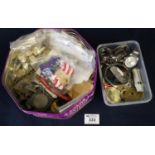 Tin of assorted watches, military insignia, coins, buttons etc. (B.P. 21% + VAT)