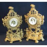 Pair of French design flat backed gilt metal figure mounted cartel type clocks with back winding