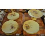 Two trays of Royal Worcester blush ivory cabinet plates, decorated with flowers, dragonflies and