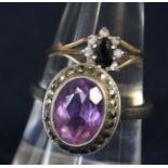 Silver and amethyst ring and a sapphire set yellow metal ring. Approximate weight 6.4 grams. (B.P.