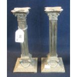 Pair of good quality silver plated square section corinthian column table candlesticks with ram's