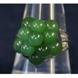 White metal and jade cluster ring. (B.P. 21% + VAT)