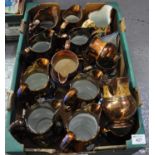 Box containing mainly Victorian copper lustre dresser jugs. (B.P. 21% + VAT)