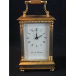 Modern heavy quality gilt brass carriage clock marked 'Fox & Simpson' to the full depth enamel Roman