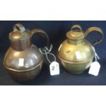 Two Jersey or Tenby type copper baluster shaped jugs with lids and loop handles. (2) (B.P. 24% incl.