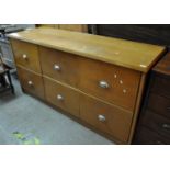 Mid Century pale oak chest of six deep drawers with chrome finish handles. (B.P. 21% + VAT)