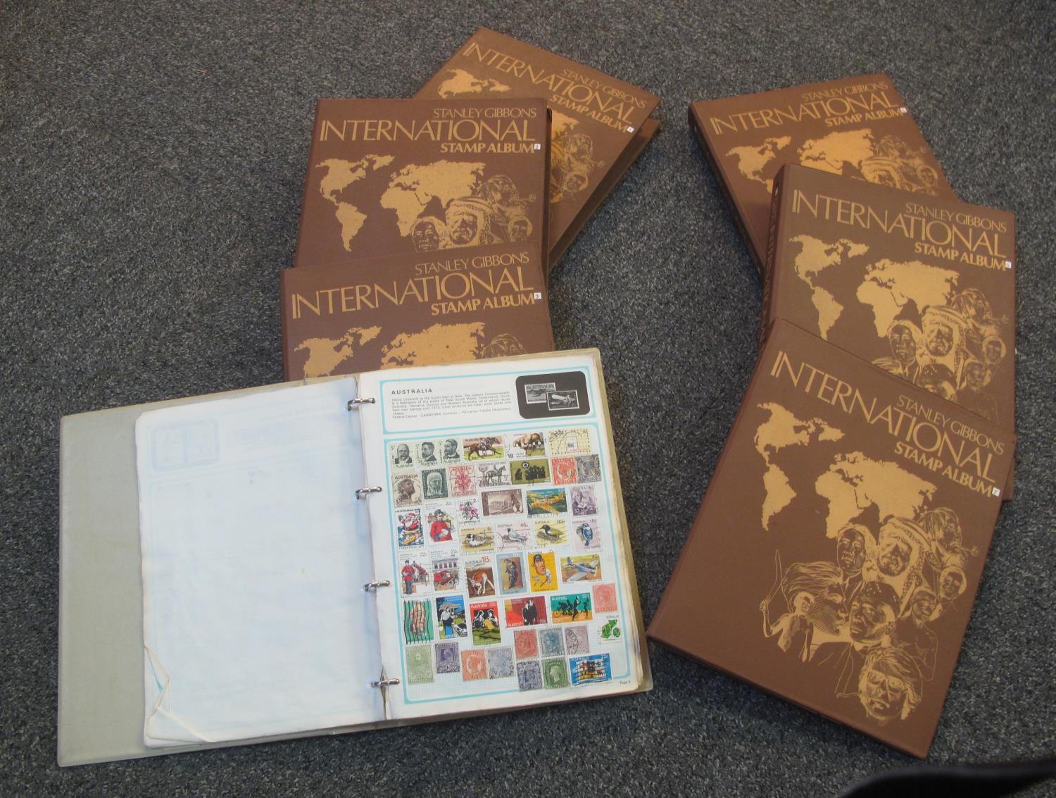 All world stamp collection in six Stanley Gibbons international albums and a Worldex album, many