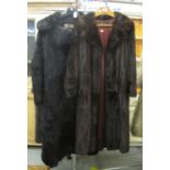 Two long black or dark brown vintage fur coats, one rabbit fur by Canopy and the other mink by