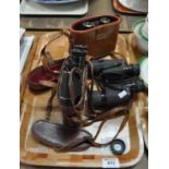 Tray of assorted binoculars to include; Tasco and Le Touquet etc. (3) (B.P. 21% + VAT)