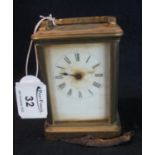 French brass carriage clock with full depth Roman face. 12cm high approx. (B.P. 21% + VAT)