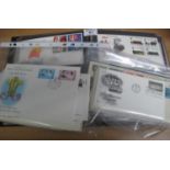 Box with collection of all world covers and first day covers in stamp album and various packets. (
