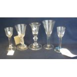 A group of assorted Georgian style wine glasses to include; bell shaped glass with knop stem and