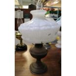 Brass oil lamp with opaque glass shade and clear chimney. (B.P. 21% + VAT)