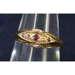 18ct gold diamond and ruby ring. Approximate weight 3 grams. (B.P. 21% + VAT)