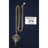Art Nouveau 9ct gold pendant set with peridot on gold plated chain. (B.P. 21% + VAT)