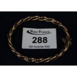 9ct gold woven twist bangle. Approximate weight 8 grams. (B.P. 21% + VAT)s.