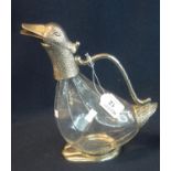 Novelty silver plated and glass claret jug in the form of a goose. (B.P. 21% + VAT) Wear to silver