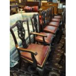 Set of six mahogany Chippendale style dining chair with leather drop in seats, standing on carved