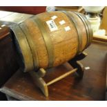 Small oak coopered barrel with brass mounts on stand. (B.P. 21% + VAT)